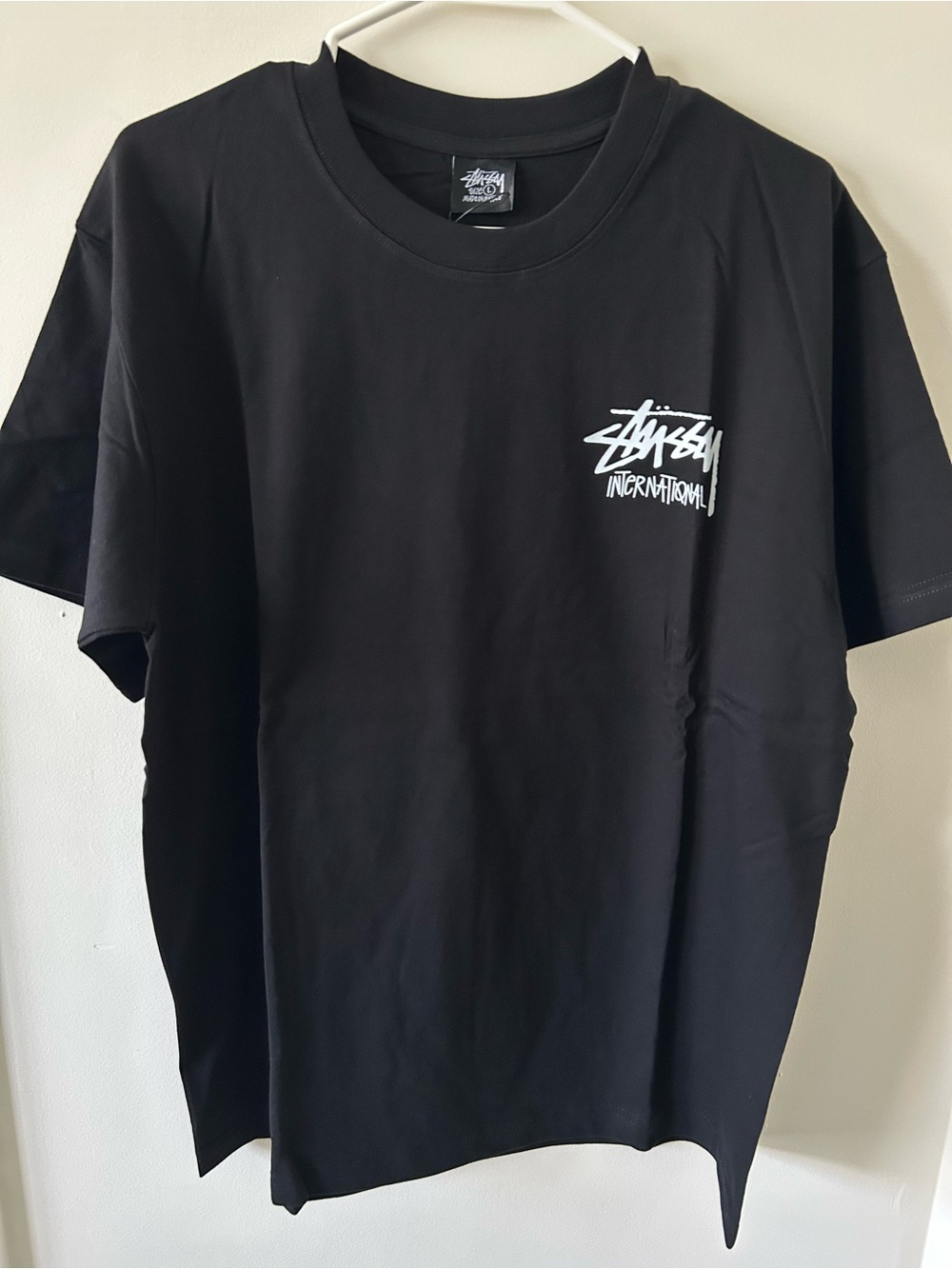 Stussy Black Short-Sleeve Logo Tee with White Chest Graphic